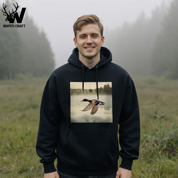 Mallard in Flight Hoodie Serene Duck Hunting Scene Over Misty Lake - Wapiti Craft